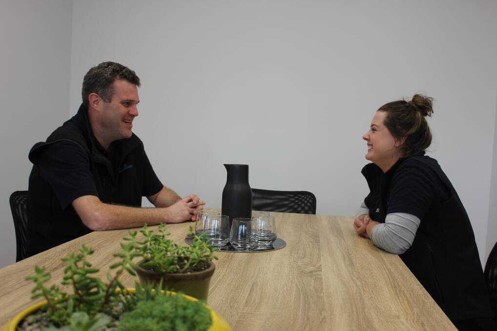 WORK SPACE: BDCU Alliance Bank Marketing and Communications manager Matt Sewell with destination manager Kayla O’Brien at the new co work space office. Photo: Mariam Koslay.