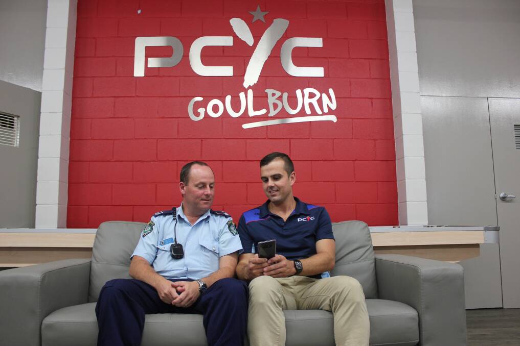 Hume LAC school liaison police youth command Gary Mutton and PCYC manager Rob Scott.