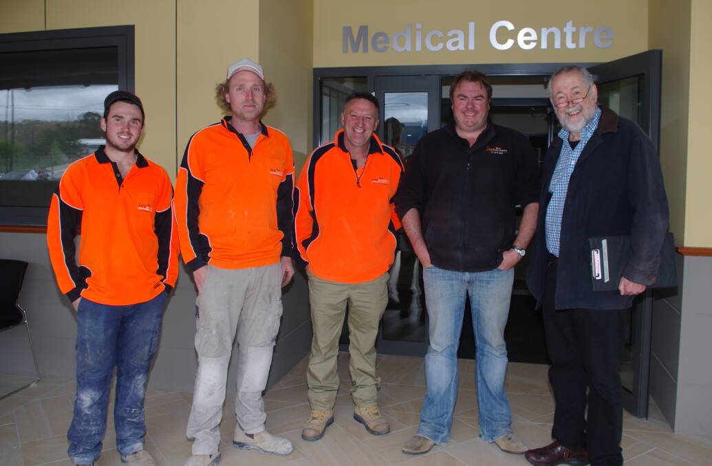 BUILDERS SUCCESS: ARW Mutligroup builders alongside John Ridley and architect Jerry Carroll at the opening of the Goulburn Health Hub. Photo: Darryl Fernance.