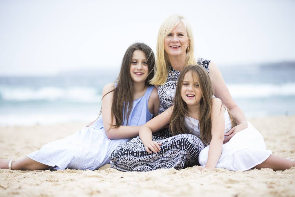 ONLINE ACHIEVEMENT: Collector mother Barbara Bryan with daughters Brooke (11) and Samantha (9). Her travel blog, Let's Go Mum !, placed 44 out of 50 for the Australian Influencer Awards this month. Photo: supplied. 
