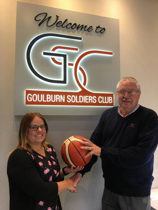 PARTNERSHIP: Louise Seaman, co-convener of the 2017 Catholic Primary Schools Basketball Challenge, with Mick Donnelly, President of the Goulburn Soldiers Club, celebrating the Soldiers Club sponsorship. Photo: supplied. 