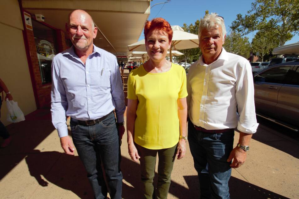 SPECIAL GUEST: Upper House candidate Rod Roberts, One Nation leader Pauline Hanson and Murray candidate Tom Weyrich on Banna Avenue on Tuesday. PHOTO: Jacinta Dickins
