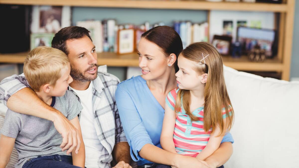 A family movie nit can be a great way for busy parents to unwind. Photo: Shutterstock