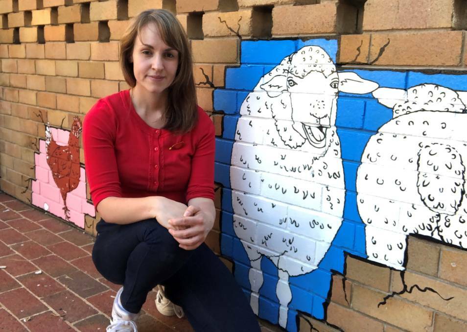 IMPROVEMENTS: Sally O'Neill designed and painted What a Cowtastrophe! at 99 Goulburn Street in Crookwell. Photo: File