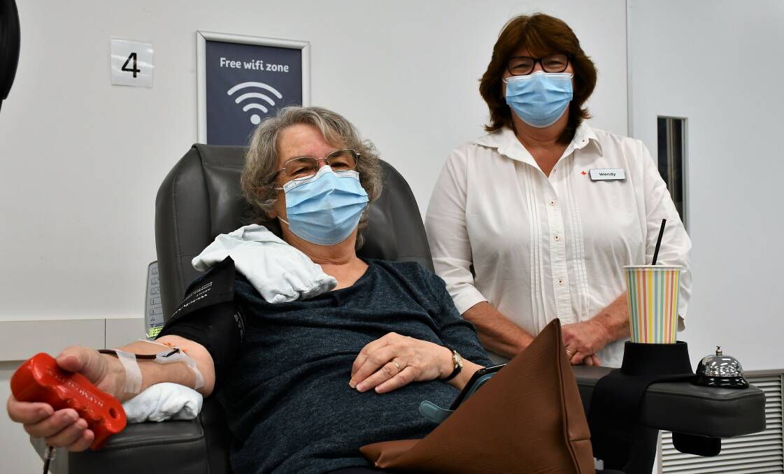 IN NEED: Christine Bernays donates blood with Lifeblood Goulburn centre manager Wendy Skelly. Picture: Hannah Neale