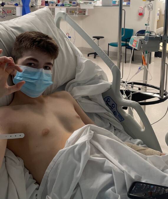 CHEEKY FIGHTER: Matt Tremble in hospital for cancer treatment. Photo: Supplied