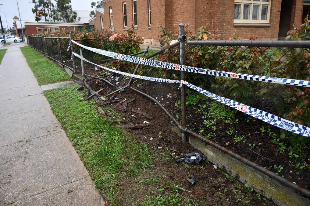 Damage to the fence at Goulburn Police Station. Photo: Hannah Neale