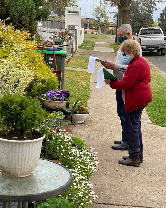 Judging the Goulburn Lilac Festival 2021 garden competition entries. Photo: Supplied