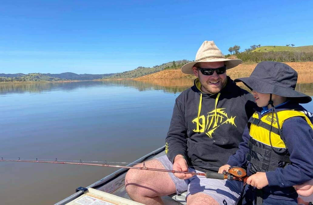 Justin Smith with his son Huxley at Wyangala Dam. Photo: Supplied