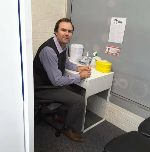 Sean Feely in his Bradfordville Pharmacy consult room. Photo: Supplied