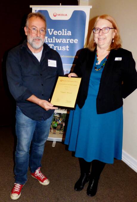 THEATRE DIRECTOR: Chrisjohn Hancock from Goulburn was presented with his 2018 Veolia Creative Arts Practice Scholarship by Wingecarribee Shire Council Cultural Development Officer and panel member Jenny Kena. Photo: Supplied