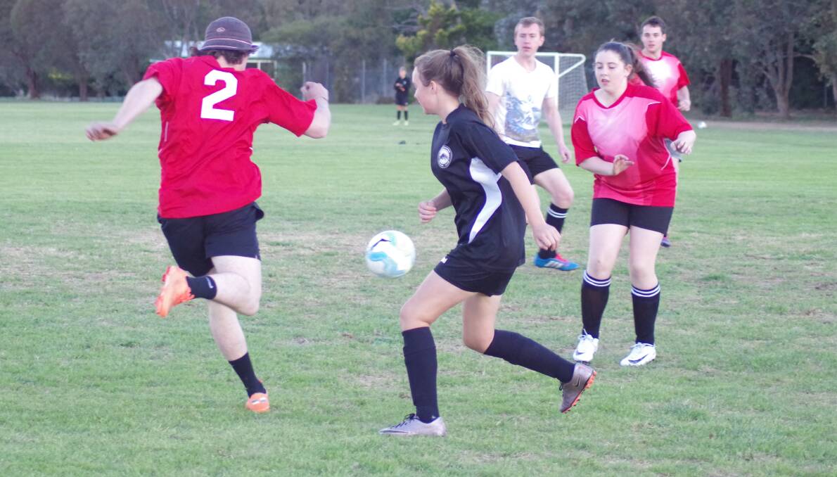 MIXED TEAMS: Astor and Panthers with a mix of male, female senior and junior players in action on the Cookbundoon fields on November 2. Photo: Darryl Fernance