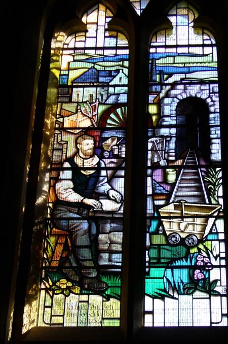 LIFE MEMORIALISED: A modern example of a window celebrating the life of a notable person, Richard Watson known as the Teeside Poet who earnt his living as a lead miner. The window includes his tools of trade and the mine entrance. Photo: Supplied