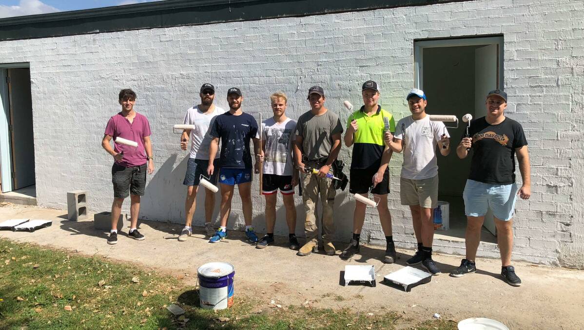 FINISHING TOUCHES: The construction team putting the final touches on the new change rooms. Photo: Goulburn Swans Football Club