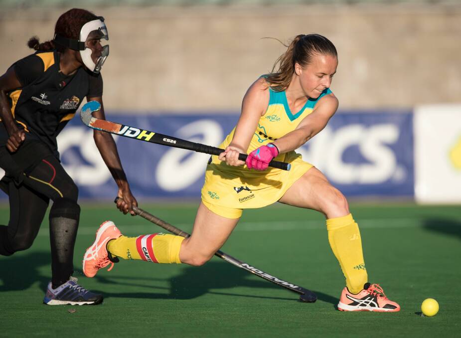 FIVE IN FIRST: Hockeyroos captain Emily Smith from Crookwell about to score one of her five goals against Papua New Guinea during the Oceania Cup game in Sydney. Photo: Hockey Australia