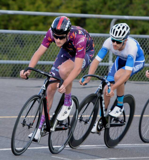 WHEEL TO WHEEL: Tearloch Carr (Southern Highlands Cycling Club) leads Zac St Vincent (Goulburn) on the Dunc Gray Cycle Track. Photo: David Carmichael 