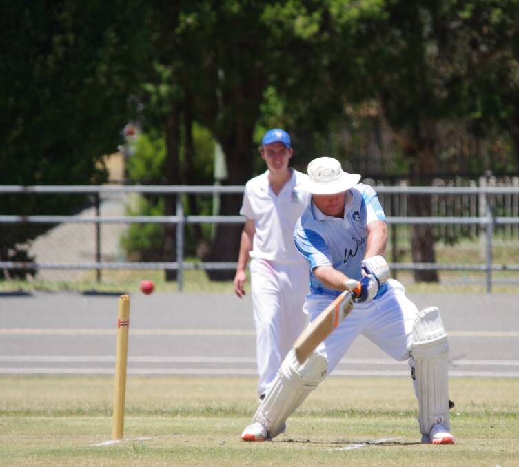 SCORING: The Stags' Craig Fahey gets a single from this deflection that narrowly missed the stumps in the game against Hibo Gold on Seiffert Oval. Photo: Darryl Fernance 