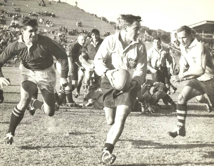 WALLABY 455: Ken Catchpole with the ball Regarded as one of Australia's great scrumhalves, passed away on December 21 aged 78. Photo: Rugby Australia