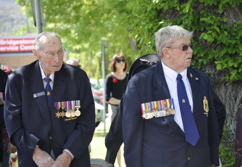 Lance Cooke with veteran Don Thomson at last year's Anzac Day commemoration in Belmore Park.