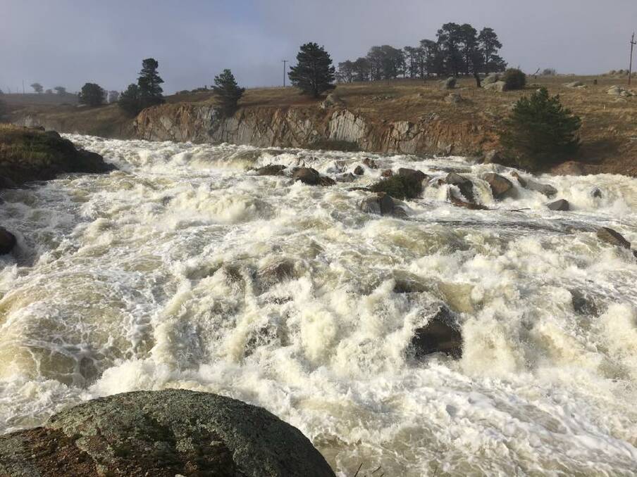 The Wollondilly River was awash at Pejar Dam on Monday morning. Photo: Helen Evans.