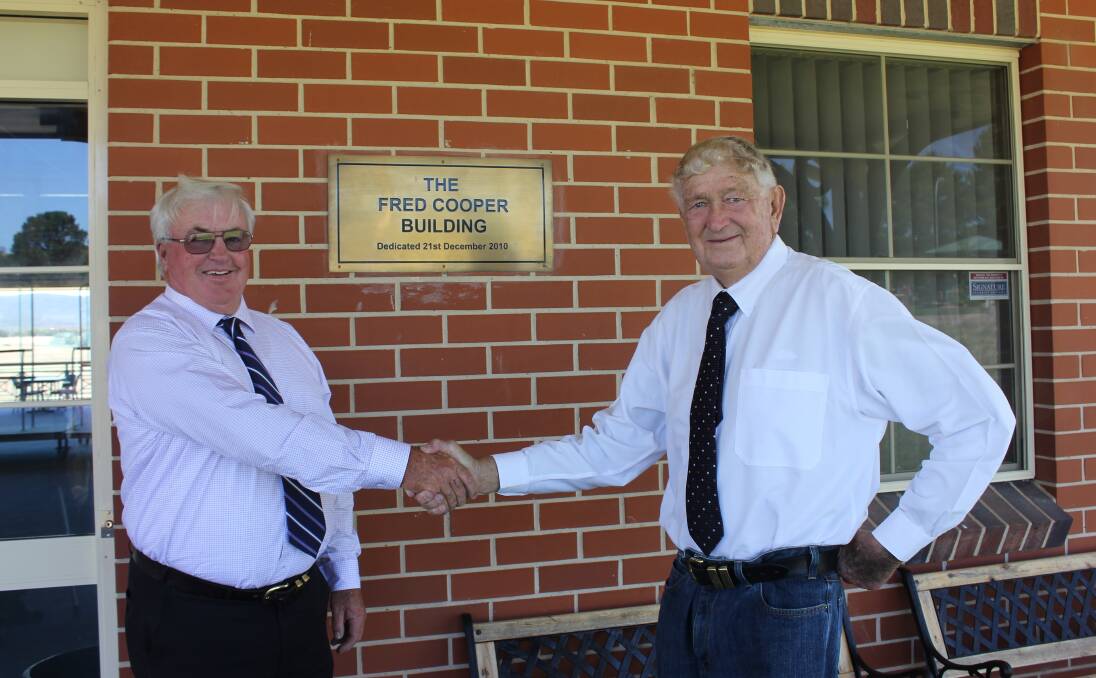 Fred Cooper stepped down as Goulburn and District Racing Club president in 2015. He's pictured with incoming president, Ken Ikin at the Fred Cooper building. Photo: David Cole.
