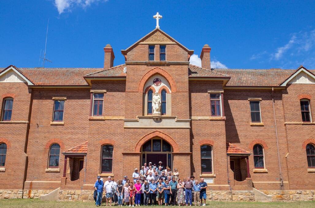 Saint John's 'old boys' and former residents of Saint Joseph's Girls Home now hold joint reunions at the latter on Taralga Road. Owners Maggie and Daryl Patterson generously open the doors to the 1907 building. Mr Gilroy attends the reunions. Photo: Michelle Doherty.