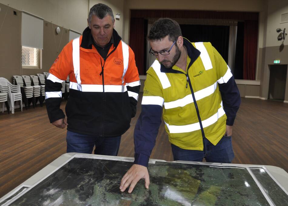 Divall's Earthmoving and Bulk Haulage director, Andy Divall, looks over the HumeLink transmission line route with TransGrid project engineer, Andrew Day. Picture by Louise Thrower.
