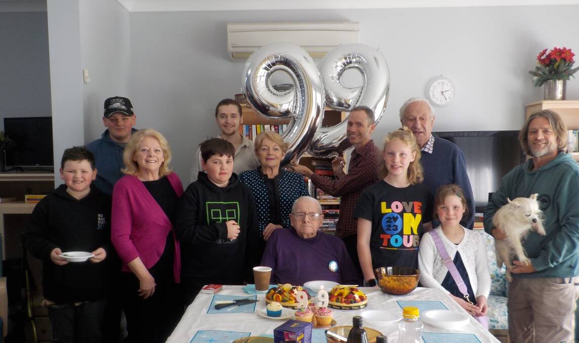 Ron Butterworth (centre) celebrated his 99th birthday on Sunday with daughters Jenny (second left) and Marilyn Price (sixth left), Jenny's husband, Roger (third right) and some of his many grandchildren and great-grandchildren. Picture by Leah Staples.