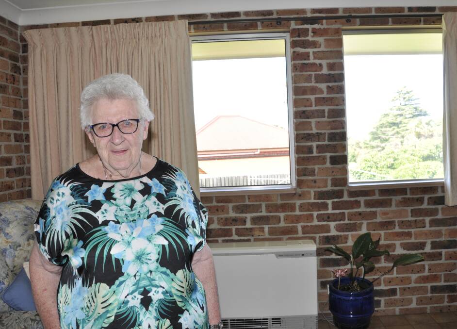 WORRIED: Joy Eldridge enjoys spending time in her living room but says the planned house at 22 Hurst Street will destroy her view. Photo: Louise Thrower.
