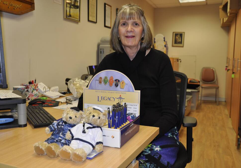 Goulburn Legacy office manager Linda Marchet displays some of the merchandise taht will be on sale during Legacy Week from August 28 to September 2. Photo: Louise Thrower.