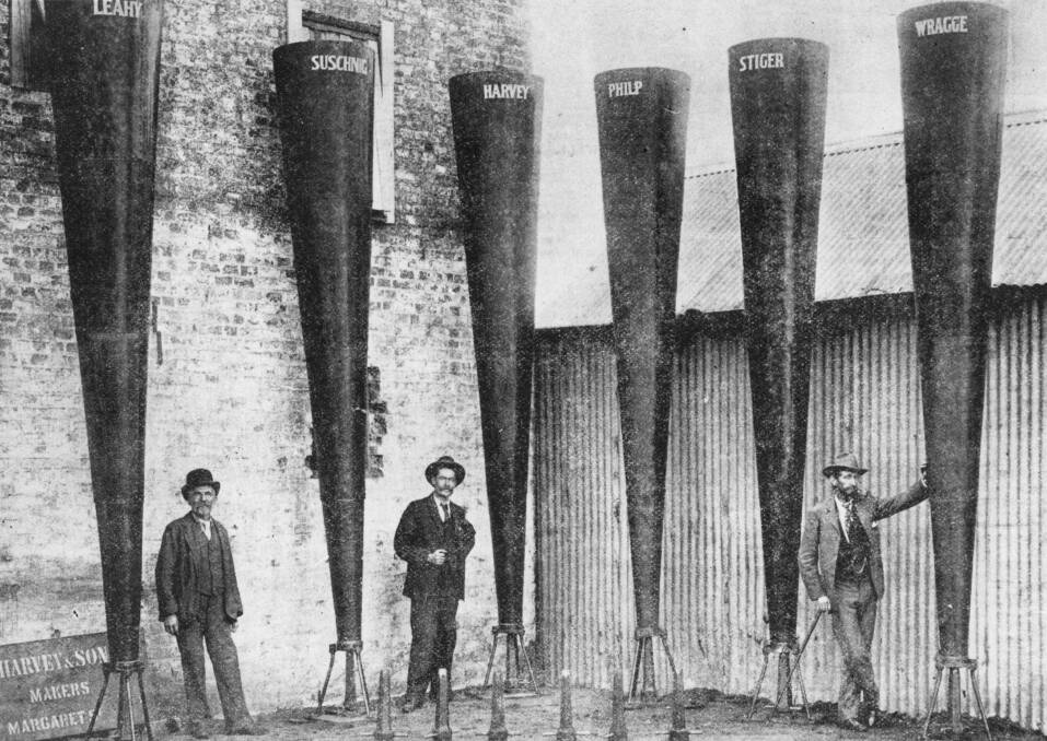 Clement Wragge, right, poses with six Stiger cannons before the guns were railed to Charleville in August, 1902. Picture courtesy State Library of Queensland. 