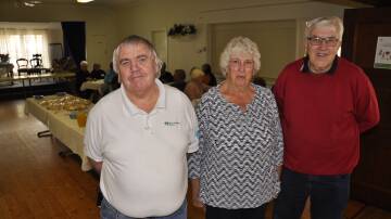 THANKS A MILLION: Goulburn Meals on Wheels president Michael Parsons, vice-president Lorraine McNeil and secretary, Ron Neate thanked volunteers with an afternoon tea at the CWA rooms on Wednesday. Photos: Louise Thrower.