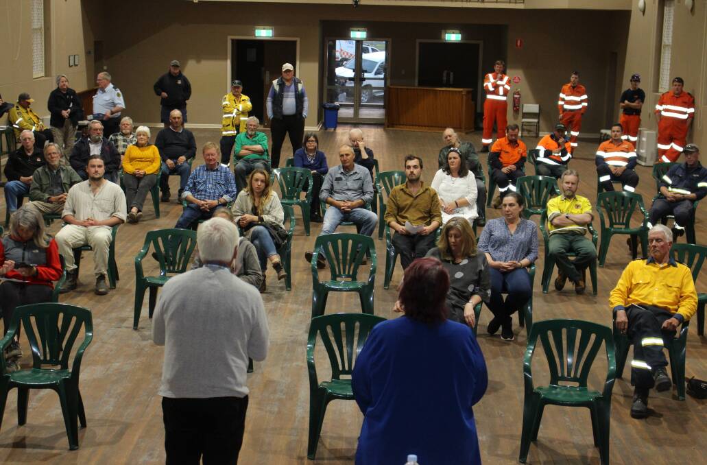 EXPLAINING: Upper Lachlan Shire Council mayor John Stafford and general manager Colleen Worthy addressed a hastily called public meeting in Taralga's Memorial Hall on Tuesday night. Photo supplied.