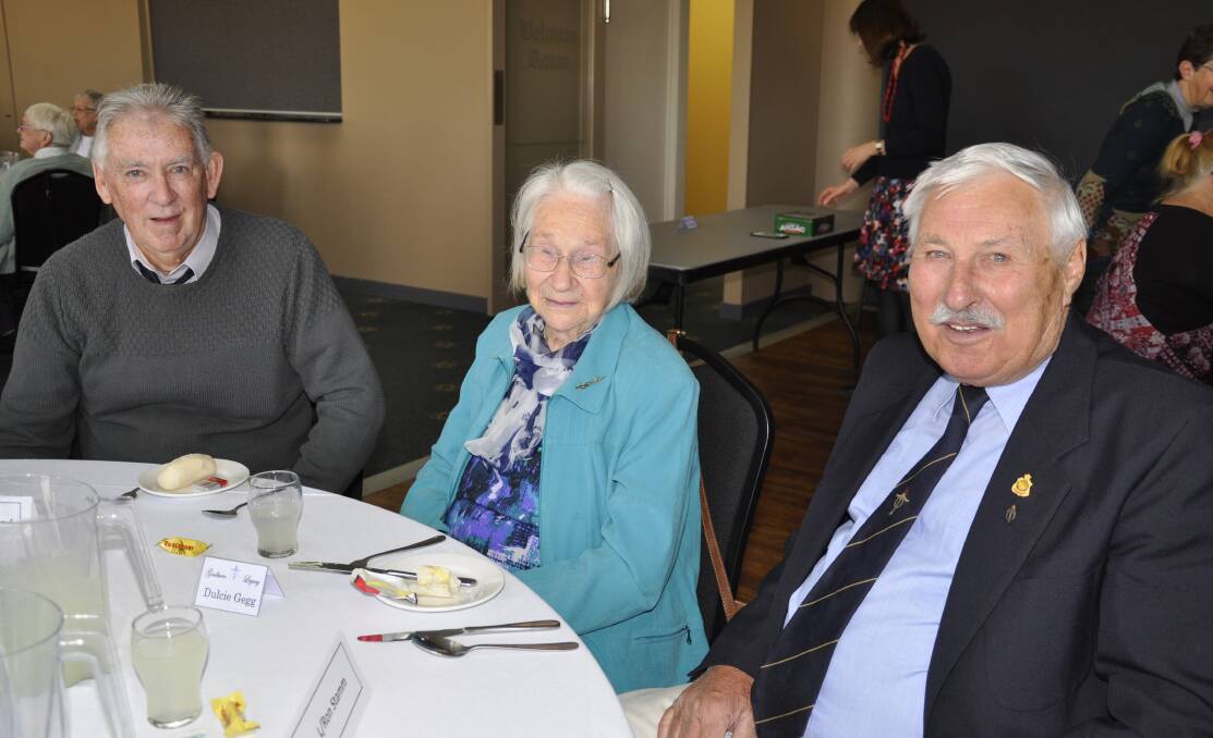 DIGGING DEEP: Legacy Appeals Committee chair Ron Stamm (right), pictured here with Dulcie Gegg and Legatee John Broadhead at a widows function, hopes people will give generously to the organisation. Photo: Louise Thrower. 