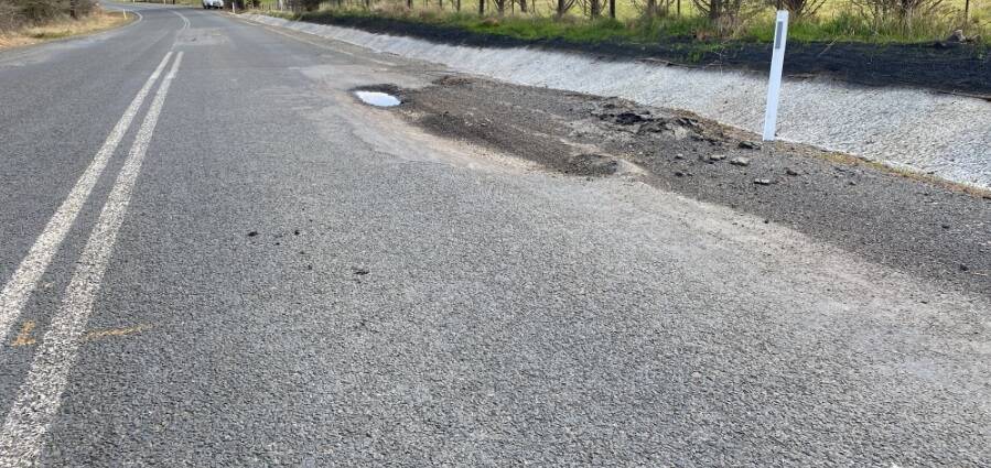 Broken edges on Jerrara Road force motorists over into the path of oncoming trucks, residents say. Picture supplied.