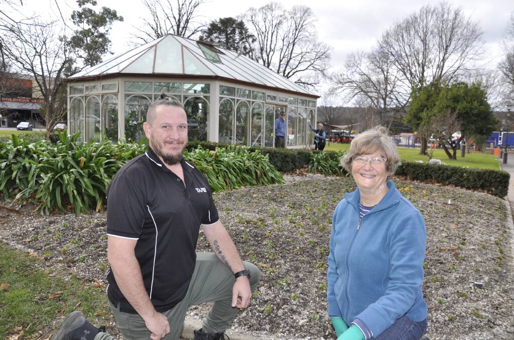 COMMUNITY PROJECT: Goulburn TAFE horticulture and landscape construction teacher Tim Dally and Heather West are among those aiming to return the Belmore Park glasshouse to its heyday. Photo: Louise Thrower. 