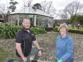 COMMUNITY PROJECT: Goulburn TAFE horticulture and landscape construction teacher Tim Dally and Heather West are among those aiming to return the Belmore Park glasshouse to its heyday. Photo: Louise Thrower. 