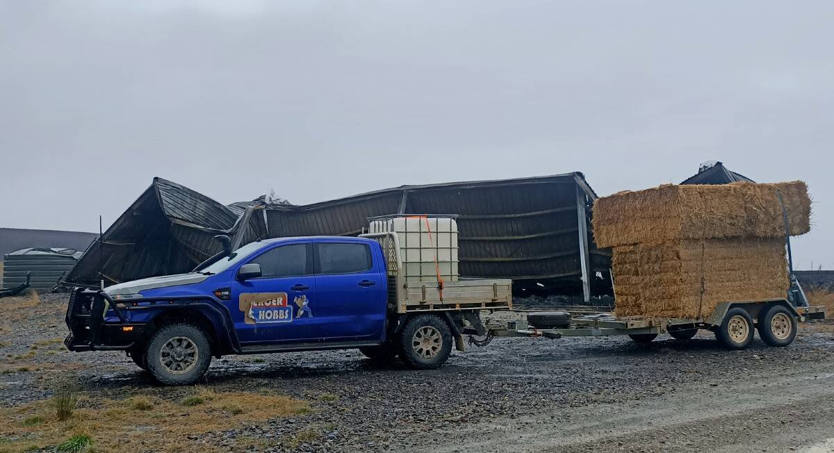 A hay delivery arrived this week for the owner of a Curraweela property owner whose hayshed was destroyed in the fire. Picture by Andrew Blake-Dyke.