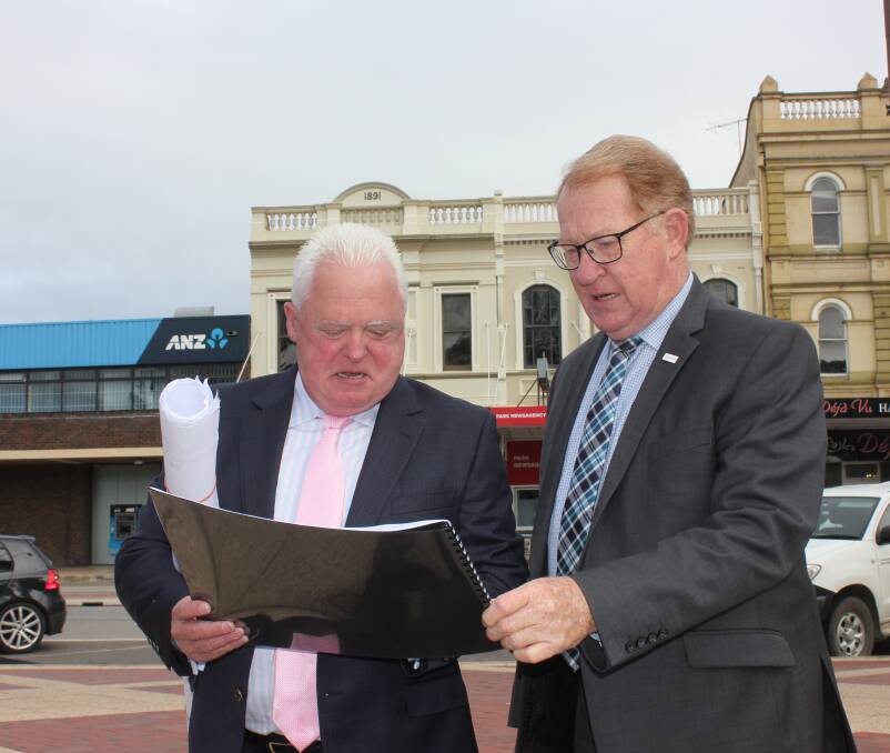 IN THE PLANNING: Signature Care CEO Graeme Croft perused plans for the aged-care complex with Mayor Bob Kirk in March, 2019. Photo: David Cole. 