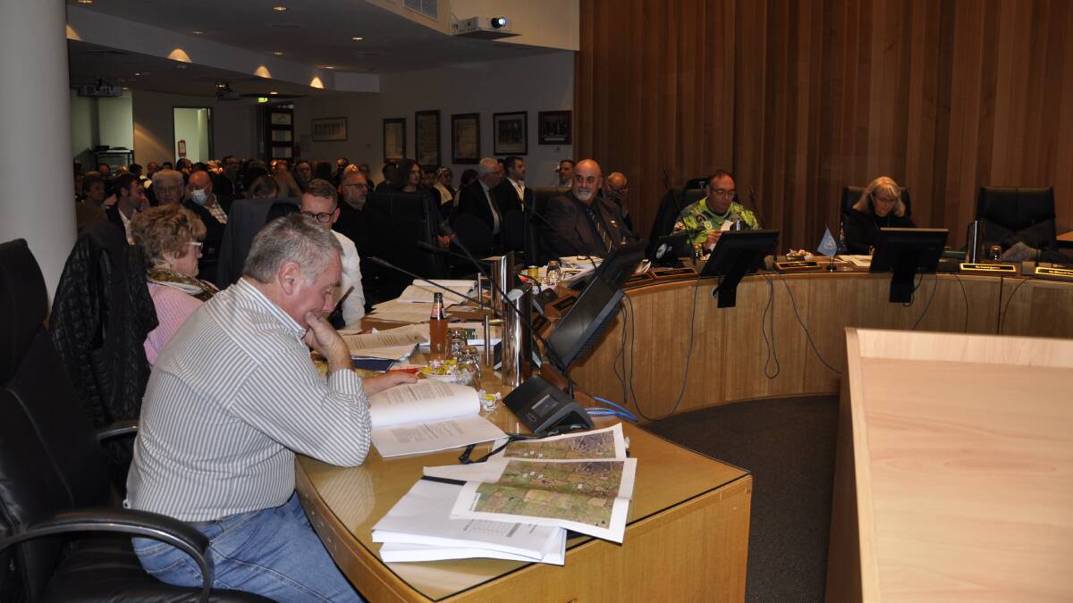 Councillors deliberating at a June meeting to discuss Wakefield Park's development application. Photo: Louise Thrower.