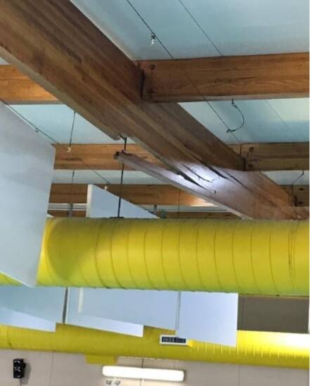 The timber roof beam inside the indoor pool showed major cracking. Another one was subsequently identified. Image sourced.