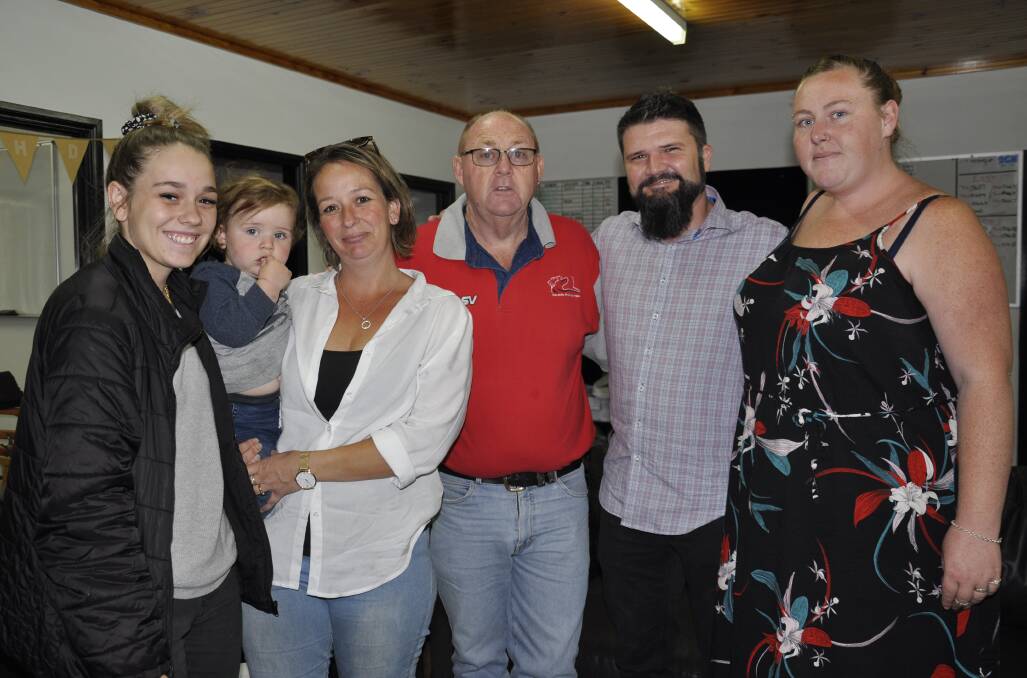 SUPPORT: President of the Goulburn Street and Classic Car Club, Stephen Parsons (centre) and secretary, Tayla Parsons, presented a cheque to the late Seb Montalto's family on Monday. They included his sister, Jasmin Montalto, brother Jack, mother Jodie Bennison and stepfather, Andrew Bennison. Photo: Louise Thrower.