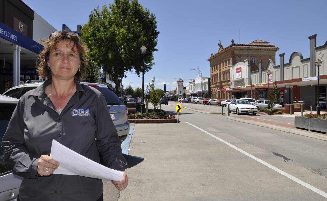 TAKING ACTION: Owner of Bi-Rite Electrical in Auburn Street, Kim Gann says the council must listen to, not muffle concerns about CBD parking. She has started a petition about the impact of a performing arts centre.