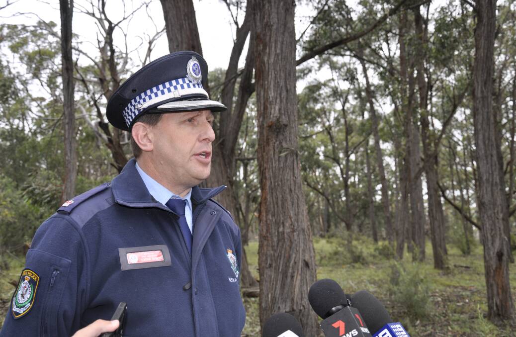 Detective Chief Inspector Brendan Bernie addresses media at the search base. 