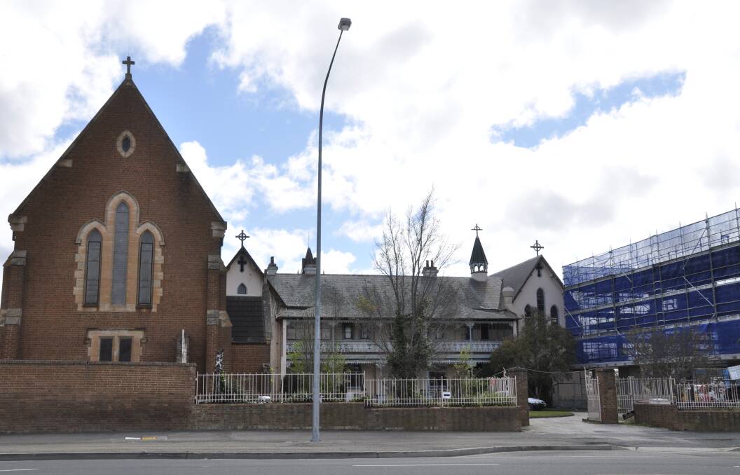 The developer of the Quest apartments in Clinton Street was penalised for this encroachment on the historic former Our Lady of Mercy convent but work was allowed to proceed. Photo: Louise Thrower.