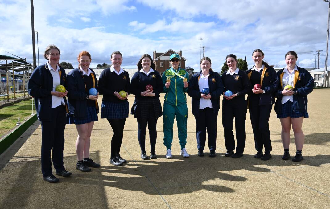 Ellen Ryan's Commonwealth Games success will be celebrated at a street parade and civic reception on Friday, August 26. Here, she's surrounded by Goulburn High School students. Photo supplied.