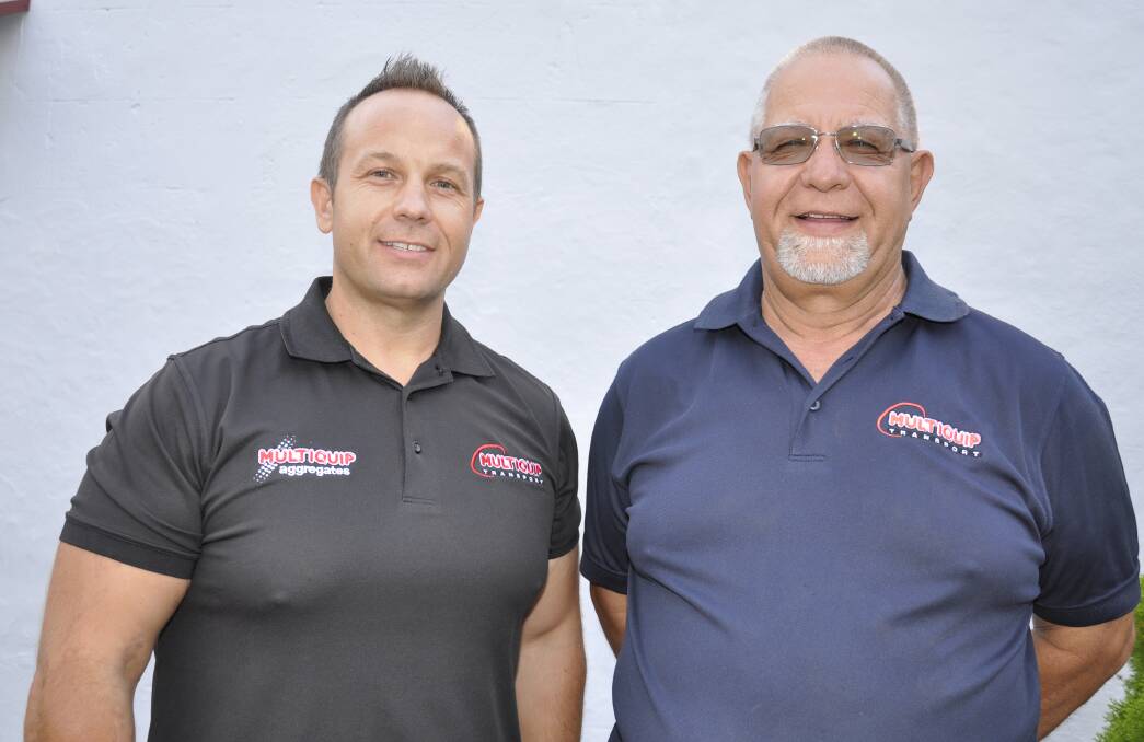 Multiquip general manager Jason Mikosic and his father Steve, the company's managing director, at a recent outreach meeting.