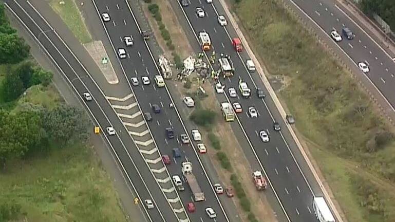 The crash occurred in the southbound lane of the Hume Highway at Woodbine. Photo: Nine News.