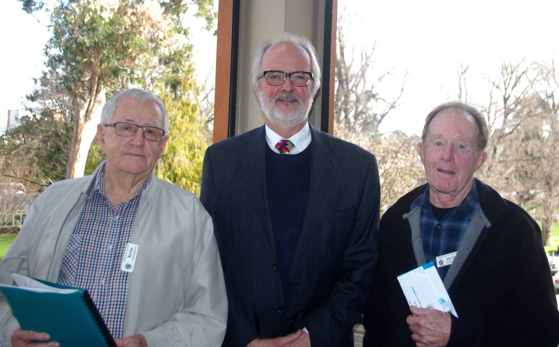 TALK: Goulburn Chamber of Commerce president Mark Bradbury with former president, Kevin Thompson and Probus Club member, Peter Simpson. Photo supplied.