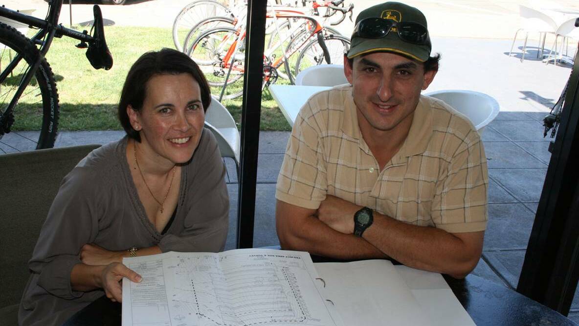 Ed Wehbe, pictured in 2014 with council planning director Louise Wakefield as he was planning a poultry farm west of Goulburn. The enterprise is expanding and now Mr Wehbe wants to build a large poultry processing plant in Common Street. 
